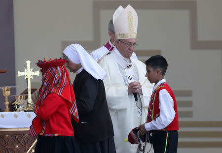 Pope Francis celebrates a mass at Huanchaco beach in Trujillo, Peru January 20, 2018. REUTERS/Pilar Olivares