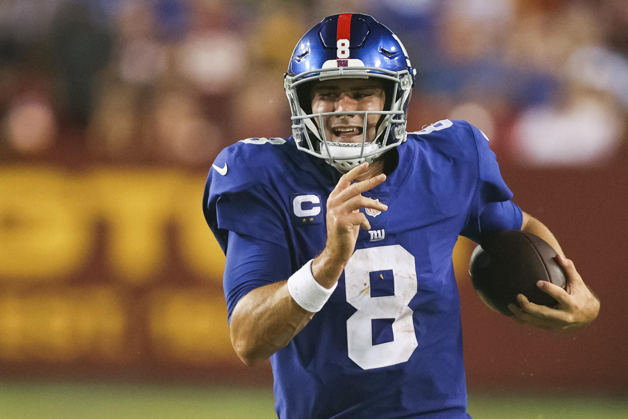 LANDOVER, MARYLAND - SEPTEMBER 16: Daniel Jones #8 of the New York Giants rushes for a long gain during the second quarter against the Washington Football Team at FedExField on September 16, 2021 in Landover, Maryland. (Photo by Rob Carr/Getty Images)