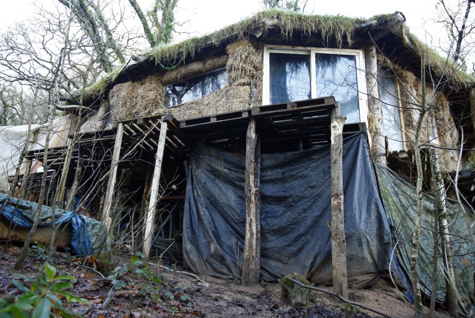 The couple built their home from trees and mud (Picture: Rex)