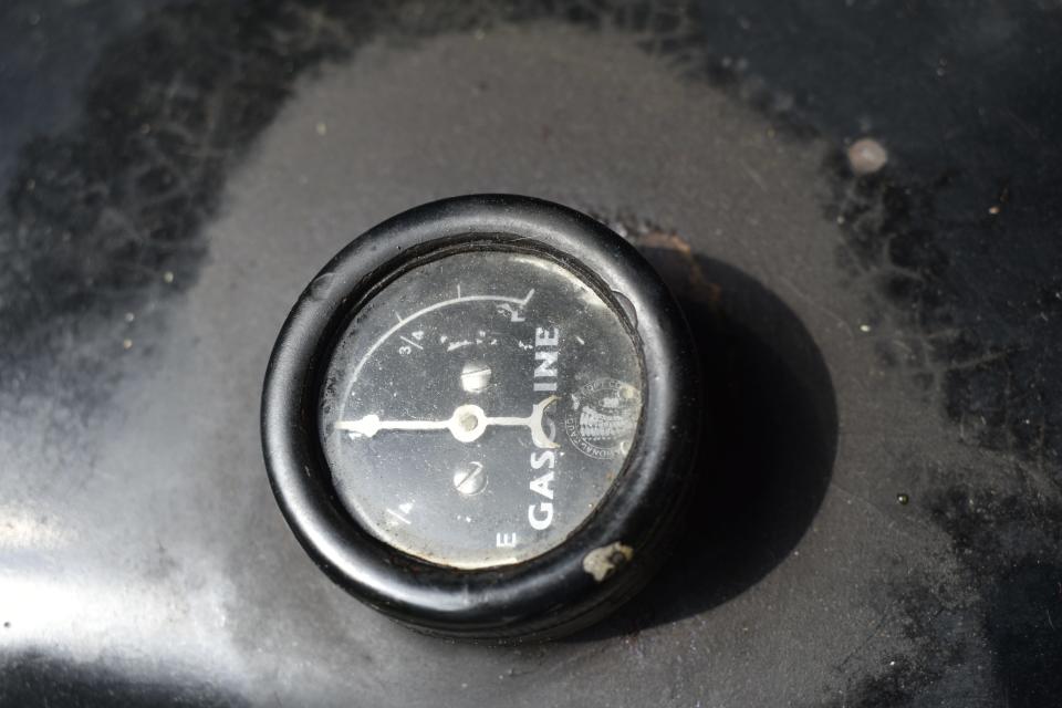 The 1923 Hudson's gas gauge sits sideways atop the gas tank on the back of the car.