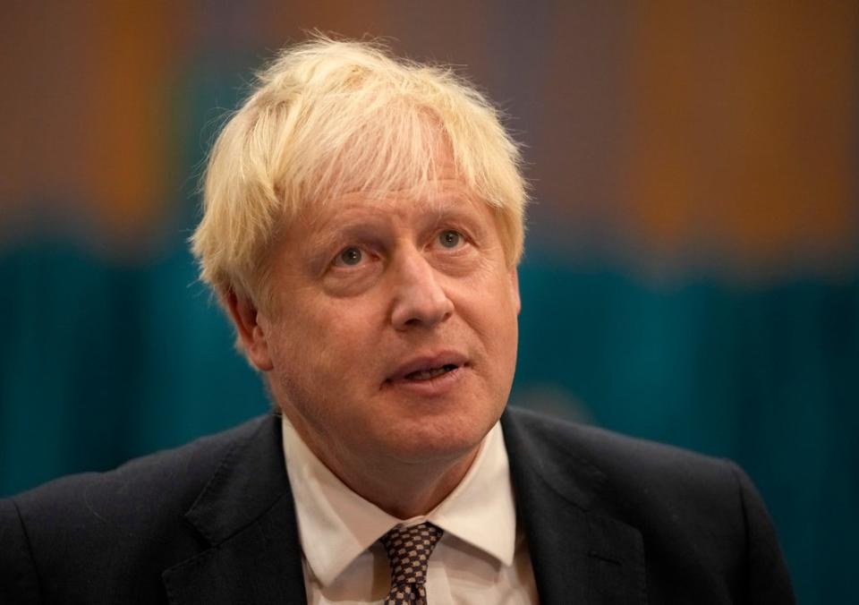 Boris Johnson at a visit to the Covid-19 vaccine centre at the Little Venice Sports Centre in west London (PA)