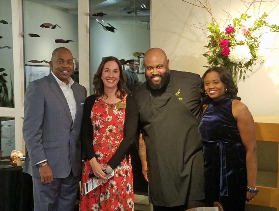 Memphis Chocolatier Phillip Ashley Rix of Phillip Ashley Chocolates will be featured at Memphis Botanic Garden's annual "Whiskey, Wine & Chocolates" event on Feb. 9, 2024. Phillip Ashley Rix (second from the right) is pictured with guests at the 2023 event.