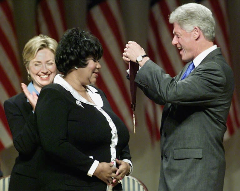 Items from the wardrobe of Aretha Franklin, pictured with then-US president Bill and former first lady Hillary in 1999, are to go on sale in New York