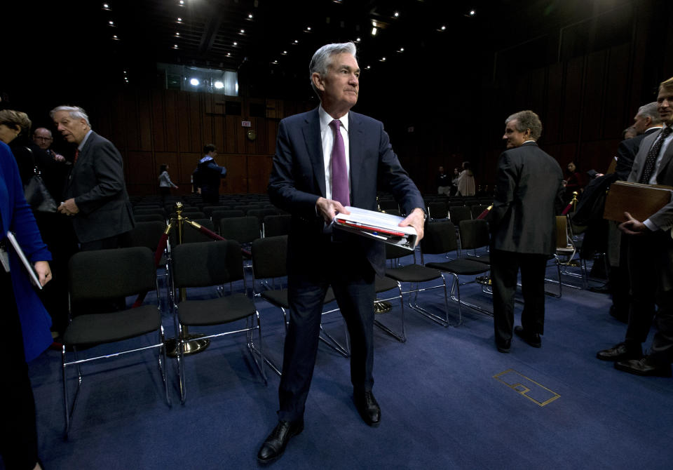 Federal Reserve Board Chair Jerome Powell leaves after the hearing on the economic outlook, on Capitol Hill in Washington, on Wednesday, Nov. 13, 2019. (AP Photo/Jose Luis Magana)