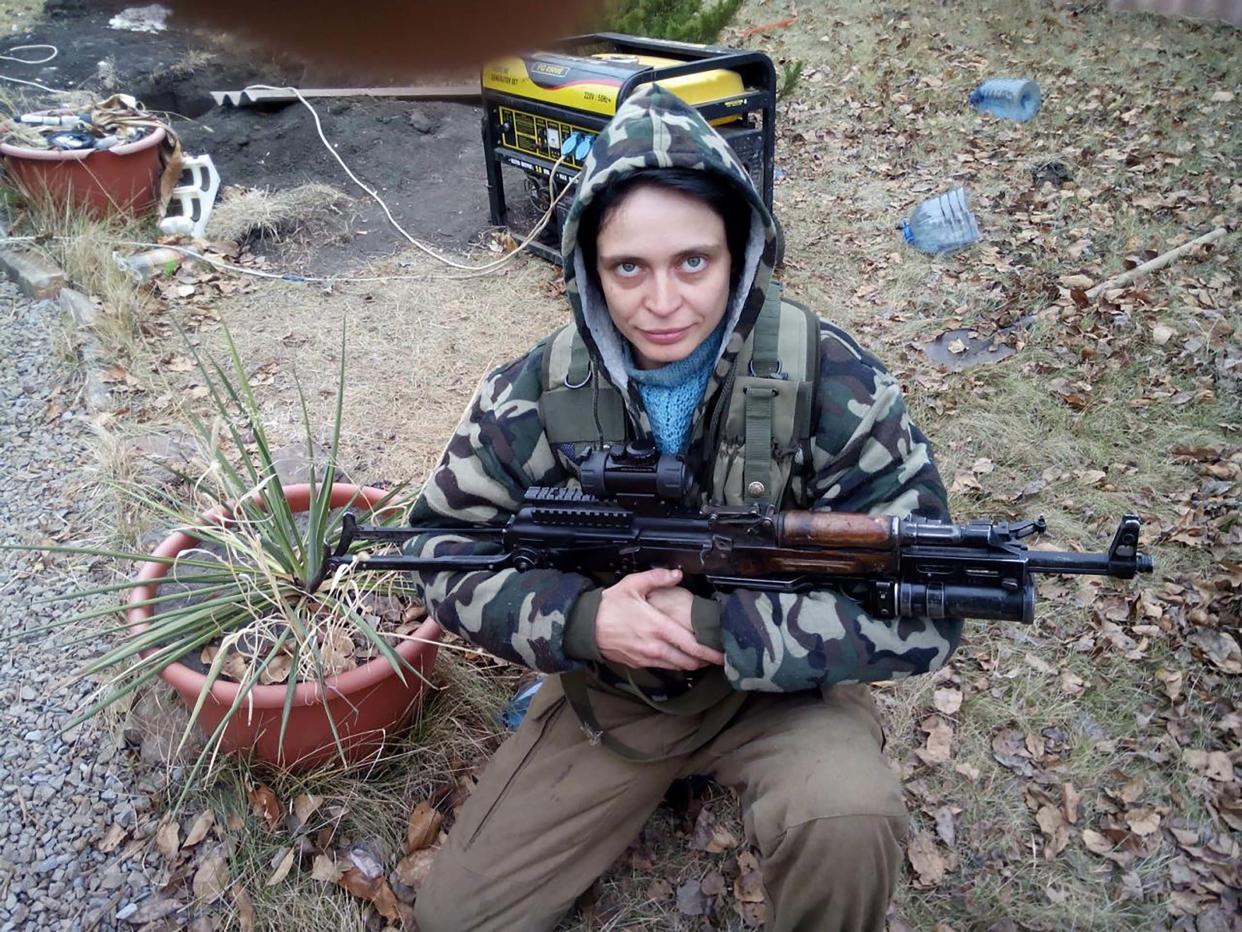 Sniper Irina Starikova holding a gun. Source: East2West/Australscope