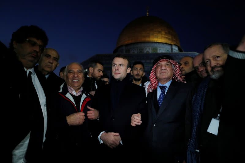 The Dome of the Rock is seen in the background as French President Emmanuel Macron visits the compound housing al-Aqsa mosque known to Muslims as Noble Sanctuary and to Jews as Temple Mount, in Jerusalem's Old City