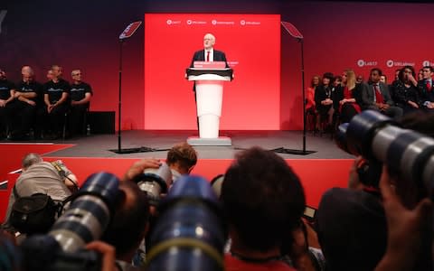 Jeremy Corbyn speaking at conference - Credit: Neil Hall/EPA