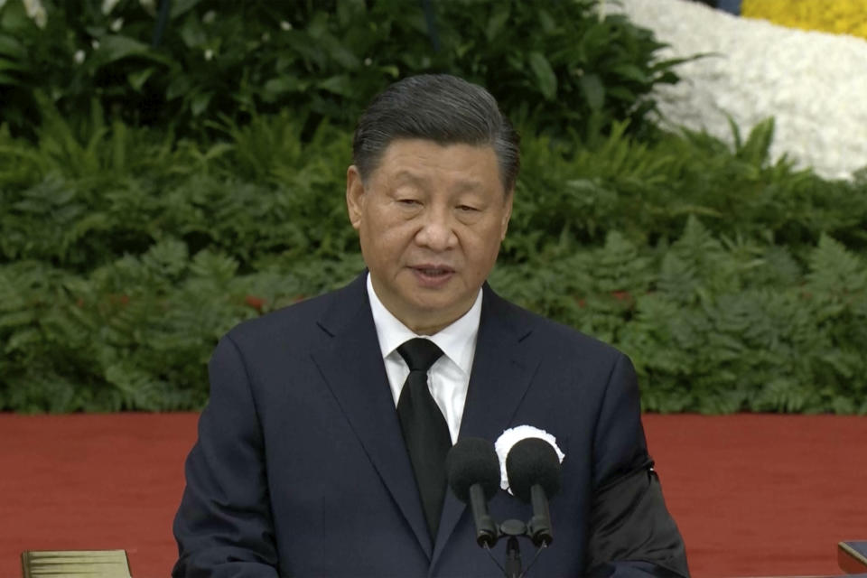 In this image taken from video footage run by China's CCTV, Chinese President Xi Jinping speaks during a formal memorial for the late former Chinese President Jiang Zemin at the Great Hall of the People in Beijing on Tuesday, Dec. 6, 2022. (CCTV via AP)