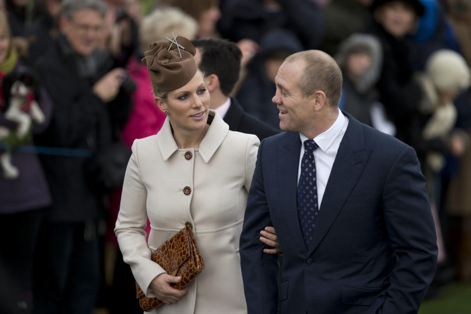 Britain's Queen Elizabeth II's granddaughter Zara Phillips and her husband rugby player Mike Tindall arrive for the British royal family's traditional Christmas Day church service in Sandringham, England, Tuesday, Dec. 25, 2012. (AP Photo/Matt Dunham)