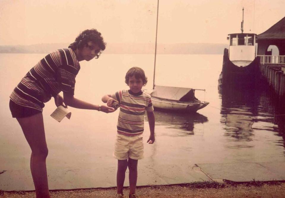 The POW bracelet can be seen on Marion Stanford’s wrist. She is shown with one of her children, possibly in the 1980s.