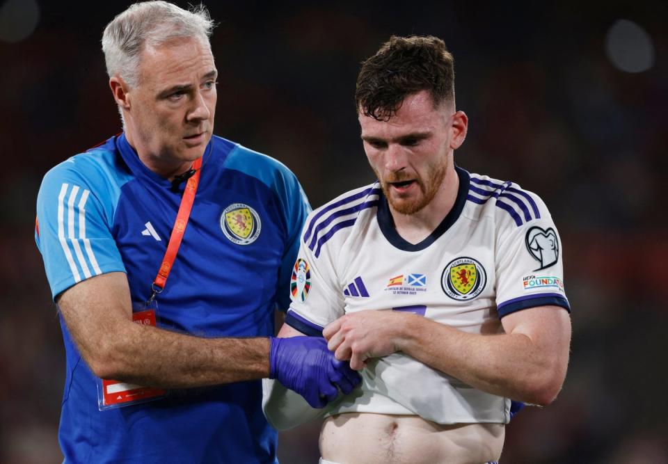 Absence: Andy Robertson suffered a shoulder injury while away on Scotland duty (REUTERS)