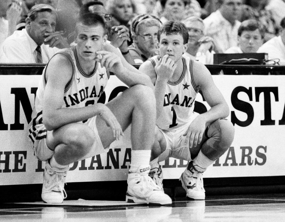 Eric Montross (left) and Damon Bailey waiting to check into an Indiana All-Stars game in 1990