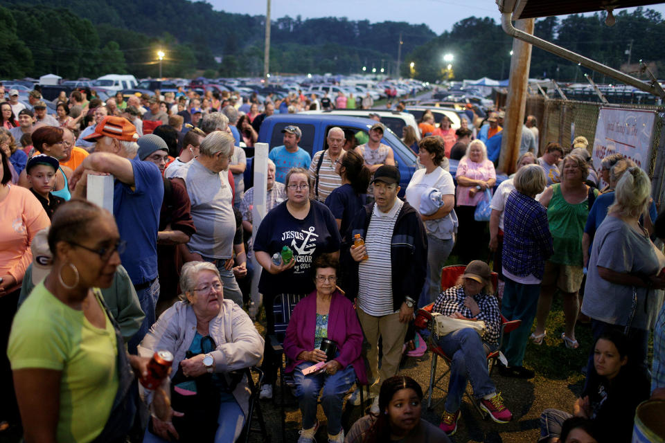 People wait to receive care