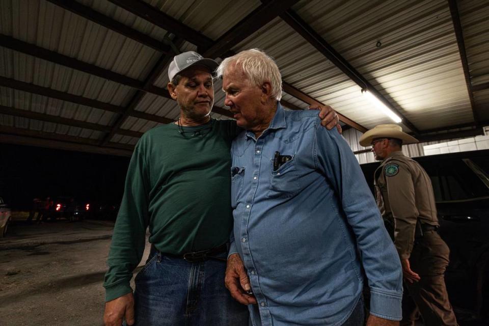 Boyd Nutt, a local deer breeder, consoles his close friend Robert Williams after Williams saw the dead bodies of his deer after the depopulation commenced at RW Trophy Ranch in Terrell on Tuesday, May 28, 2024.