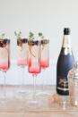 <p>Nothing says chic like a bubbly ombré cocktail.</p><p>Get the recipe from <a href="http://theeffortlesschic.com/2013/the-table/cocktail-hour-blackberry-thyme-sparkler/" rel="nofollow noopener" target="_blank" data-ylk="slk:The Effortless Chic;elm:context_link;itc:0;sec:content-canvas" class="link ">The Effortless Chic</a>.</p>