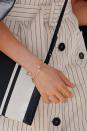 <p>Meghan Markle shook hands with people at the Commonwealth Heads of Government Meeting in April wearing thin bands on nearly every finger, including her thumb. The move was "unusual for a British royal to do," Kay says, but she'd done it before on a trip to Scotland. (Pssst: That gorgeous <a rel="nofollow noopener" href="https://www.taijewelry.com/collections/bracelets/products/gold-open-bracelet-1?variant=42030620294" target="_blank" data-ylk="slk:open bracelet from Tai;elm:context_link;itc:0;sec:content-canvas" class="link ">open bracelet from Tai</a> is only $65.) </p>