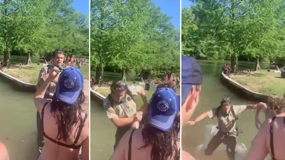 A Texas park ranger is seen being pushed in a lake before he was allegedly pushed by a man from behind.