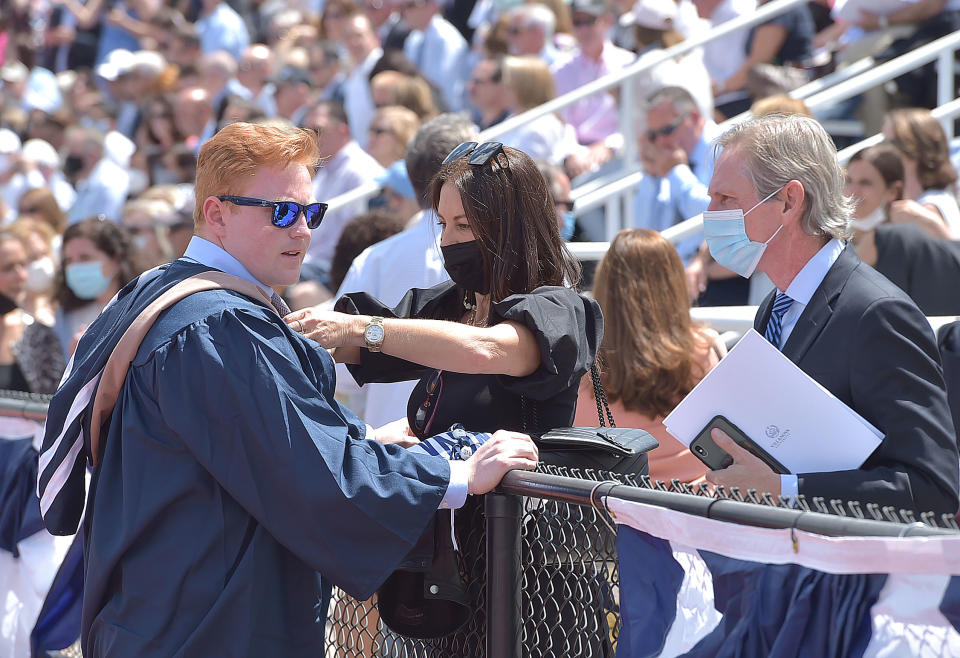 Radnor, PA. May,15 : One last chance for mom to take care of this Villanova University graduate before the schools' 178th Commencement Friday  May 14, 2021 at Villanova Stadium. They are headed to work in New York City where they will room together. (Photo by Pete Bannan/MediaNews Group/Daily Times via Getty Images)