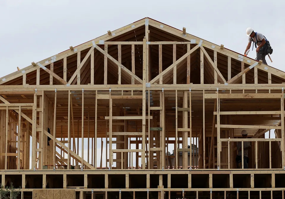 PHOENIX, AZ - MARCH 05:  A worker climbs on the roof of a home under construction at the Pulte Homes Fireside at Norterra-Skyline housing development on March 5, 2013 in Phoenix, Arizona. In 2008, Phoenix, Arizona was at the forefront of the U.S. housing crisis with home prices falling 55 percent between 2005 and 2011 leaving many developers to abandon development projects. Phoenix is now undergoing a housing boom as sale prices have surged 22.9 percent, the highest price increase in the nation, and homebuilders are scrambling to buy up land.  (Photo by Justin Sullivan/Getty Images)