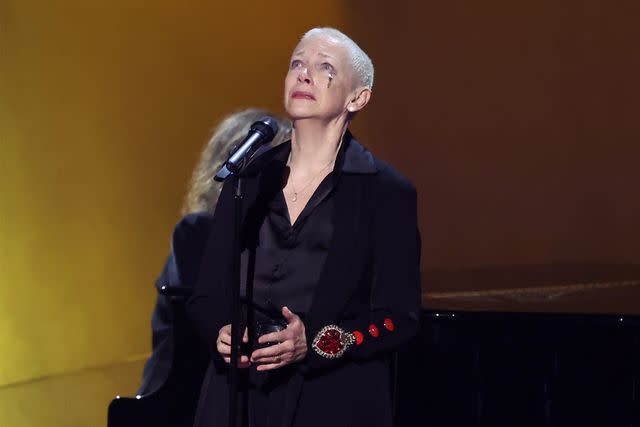 <p>Amy Sussman/Getty Images</p> Annie Lennox performs at the 2024 Grammys.