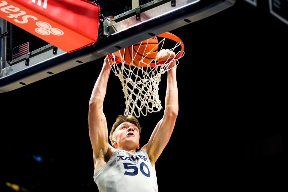 Xavier Musketeers forward Gytis Nemeiksa (50) dunks the ball in the second half of the NCAA basketball game between the Winthrop Eagles and Xavier Musketeers on Saturday, Dec. 16, 2023, at the Cintas Center in Cincinnati. Xavier won 75-59.