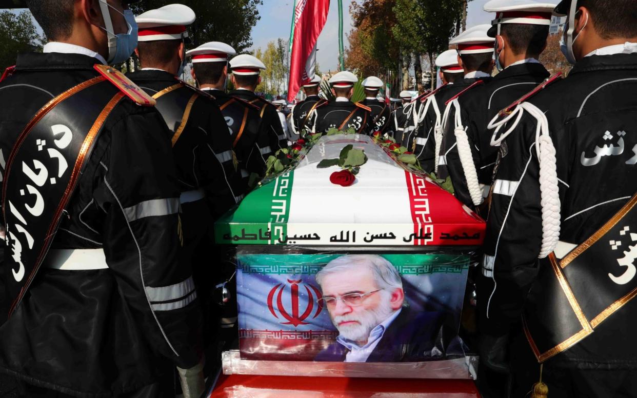 Iranian soldiers carry the coffin of slain nuclear scientist Mohsen Fakhrizadeh during his funeral procession at the defence ministry in Tehran, Iran, 30 November 2020 - Iranian Defence Ministry