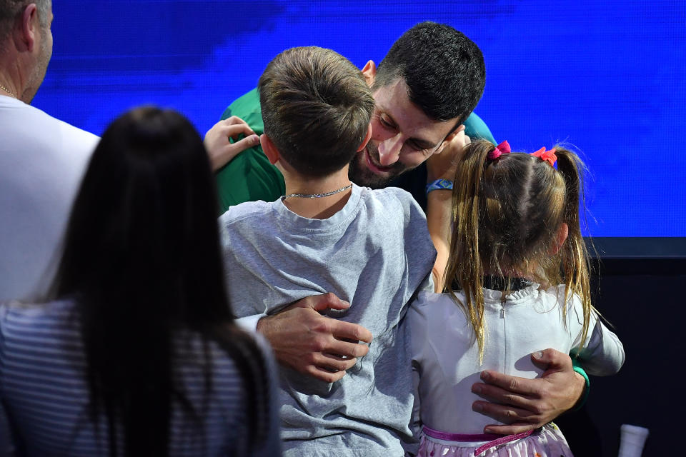 Novak Djokovic celebrates with his children.