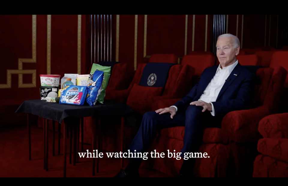 President Biden is seen next to various snacks in screenshot of a video released by the White House focused on 