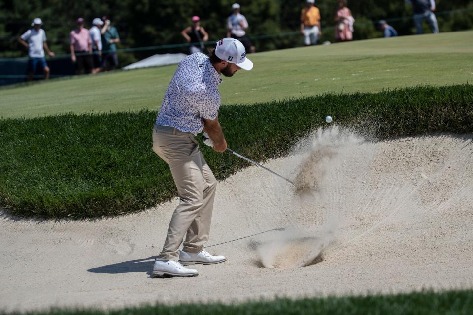 Max Homa hits out of a bunker during the 1st round of the PGA's BMW Championship at the Wilmington Country Club, the first ever PGA event held in Delaware, on Thursday, Aug. 18, 2022. 