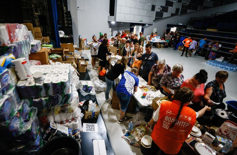 Evacuees from Russia's Belgorod region bordering Ukraine receive humanitarian aid in Belgorod