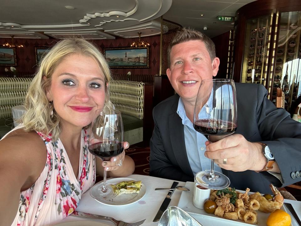 The author and her husband eating dinner aboard the ship