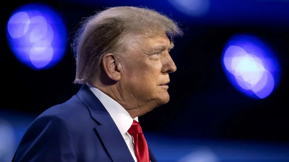 PHOTO: Former President and Republican presidential candidate Donald Trump takes the stage during the Turning Point Action Conference in West Palm Beach, Florida, July 15, 2023. (Marco Bello/Reuters)