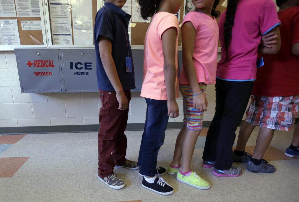 In this Sept. 10, 2014, file photo, detained immigrant children line up in the cafeteria at the Karnes County Residential Center in Karnes City, Texas.&nbsp; (Photo: Eric Gay/AP)