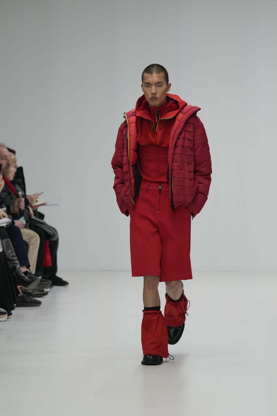 A model wears a creation as part of the men's K-Way Fall-Winter 2024-2025 collection, that was presented in Milan, Italy, Sunday, Jan. 14, 2024. (AP Photo/Antonio Calanni).
