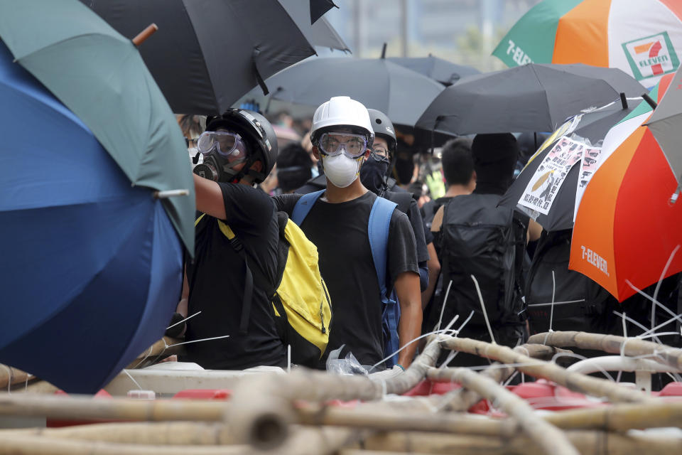 A demonstrator stands at a barricade made of bamboo poles during a protest in Hong Kong, Saturday, Aug. 24, 2019.&nbsp; (Photo: ASSOCIATED PRESS)