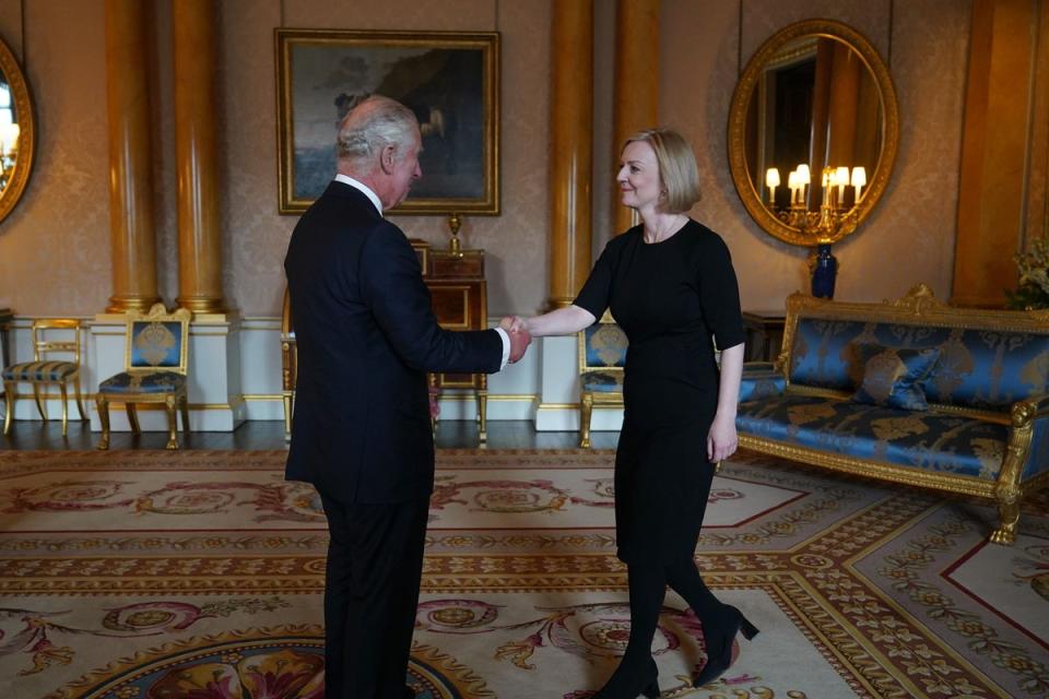 Charles shakes hands with Liz Truss during their first audience at Buckingham Palace (Yui Mok/PA) (PA Wire)