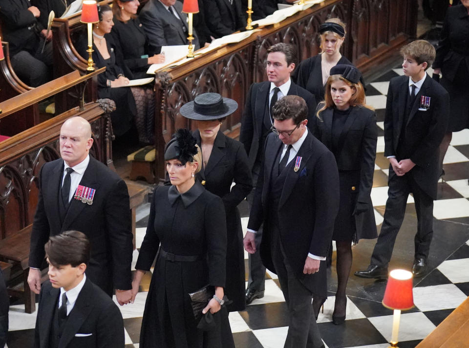 LONDON, ENGLAND - SEPTEMBER 19: (L-R, from front) Members of the royal family Samuel Chatto, Mike Tindall and Zara Tindall, Princess Eugenie and Jack Brooksbank, Princess Beatrice and Edoardo Mapelli Mozzi, Lady Louise Windsor and James, Viscount Severn attend the State Funeral of Queen Elizabeth II, held at Westminster Abbey, on September 19, 2022 in London, England.  Elizabeth Alexandra Mary Windsor was born in Bruton Street, Mayfair, London on 21 April 1926. She married Prince Philip in 1947 and ascended the throne of the United Kingdom and Commonwealth on 6 February 1952 after the death of her Father, King George VI. Queen Elizabeth II died at Balmoral Castle in Scotland on September 8, 2022, and is succeeded by her eldest son, King Charles III. (Photo by Dominic Lipinski - WPA Pool/Getty Images)