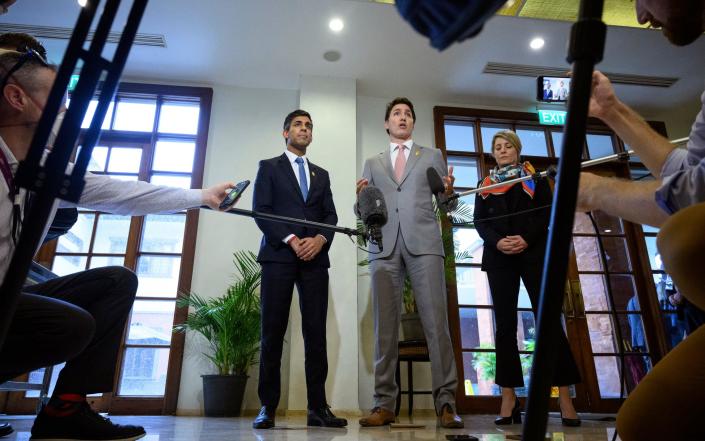 Rishi Sunak and Justin Trudeau speak to reporters at the G20 summit in Bali, Indonesia, today - Leon Neal /Getty Images 