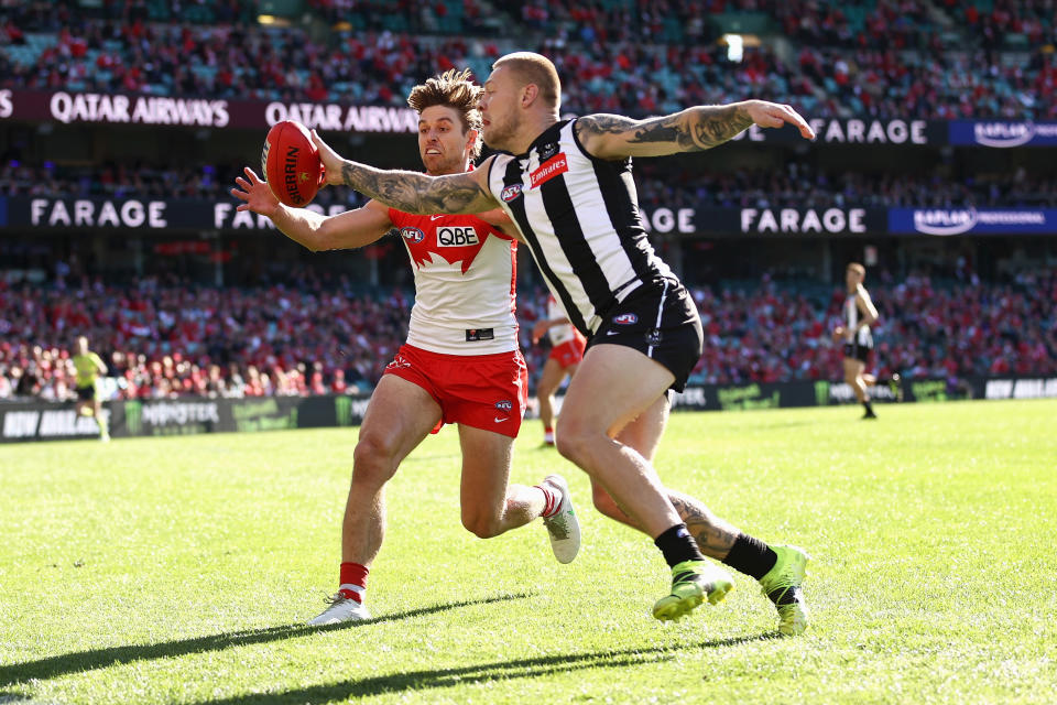 Jordan De Goey competes for the ball with and Dane Rampe at the Sydney Cricket Ground.