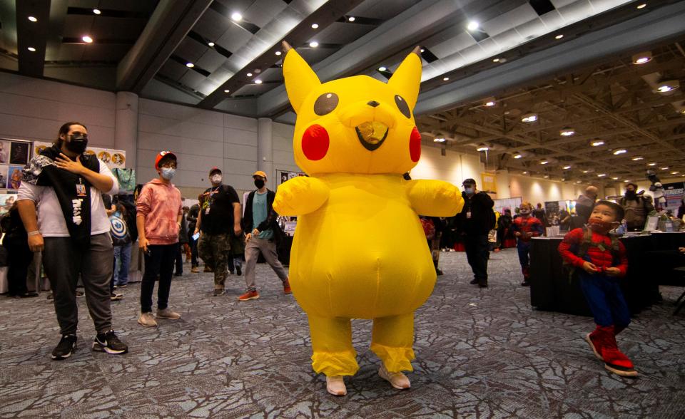 A cosplayer poses for photos during the 2021 Fan Expo Canada at the Metro Toronto Convention Center MTCC in Toronto, Canada, on Oct. 22, 2021. As one of the largest Comics, Sci-Fi, Anime and Gaming events in North America, this event is held here from Friday to Sunday. (Photo by Zou Zheng/Xinhua via Getty Images)