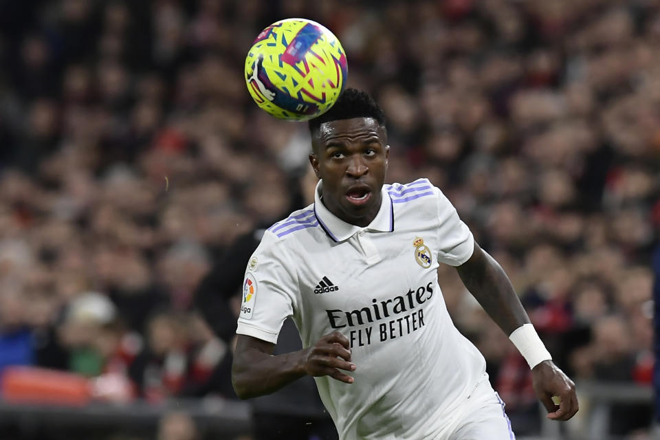 Real Madrid's Vinicius Junior controls the ball during the Spanish La Liga soccer match between Athletic Club Bilbao and Real Madrid at the San Mames stadium in Bilbao, Spain, Sunday, Jan. 22, 2023. (AP Photo/Alvaro Barrientos)