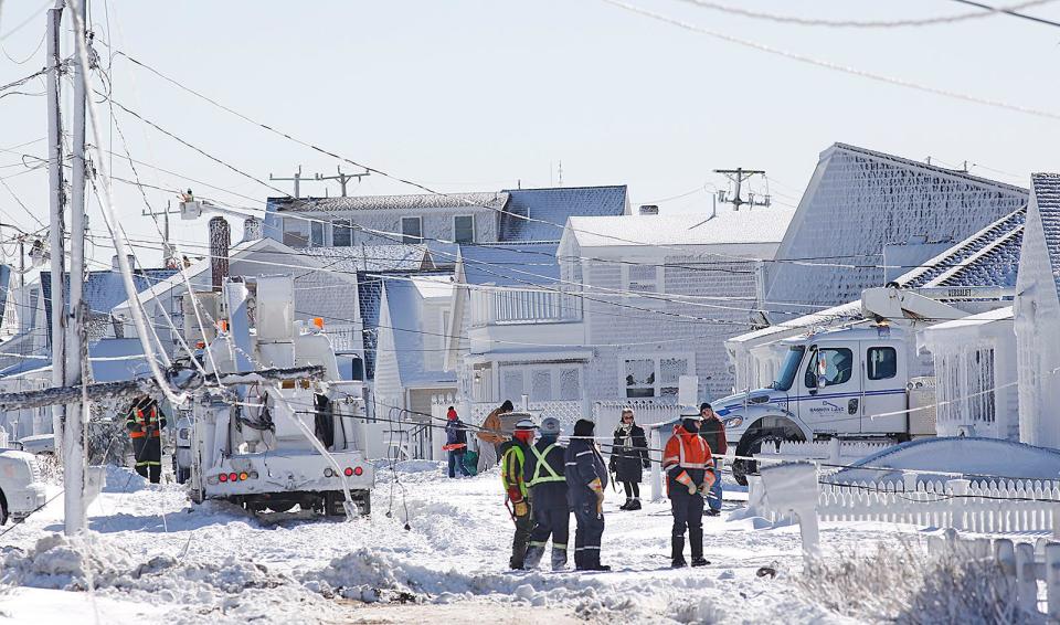 Downed poles and wires on Foster Avenue in Marshfield on Sunday, Jan. 30, 2022.