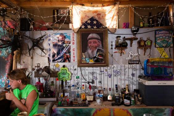 Home sweet home: a Slab City resident lights up (Matt Stuart/MAPS)