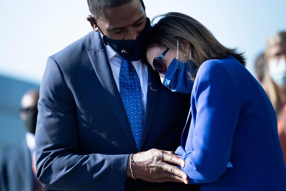 <p>House Speaker Nancy Pelosi and Michael Collins, Lewis's longtime chief of staff, shared a touching embrace as the Congressman's remains were carried out of the Capitol. Collins worked for Lewis for over 21 years. </p>