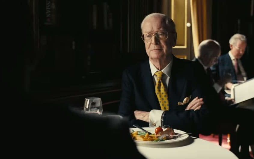 Michael Caine, appearing in Tenet, will stand firm as the rest of Hollywood crumbles - Warner Bros