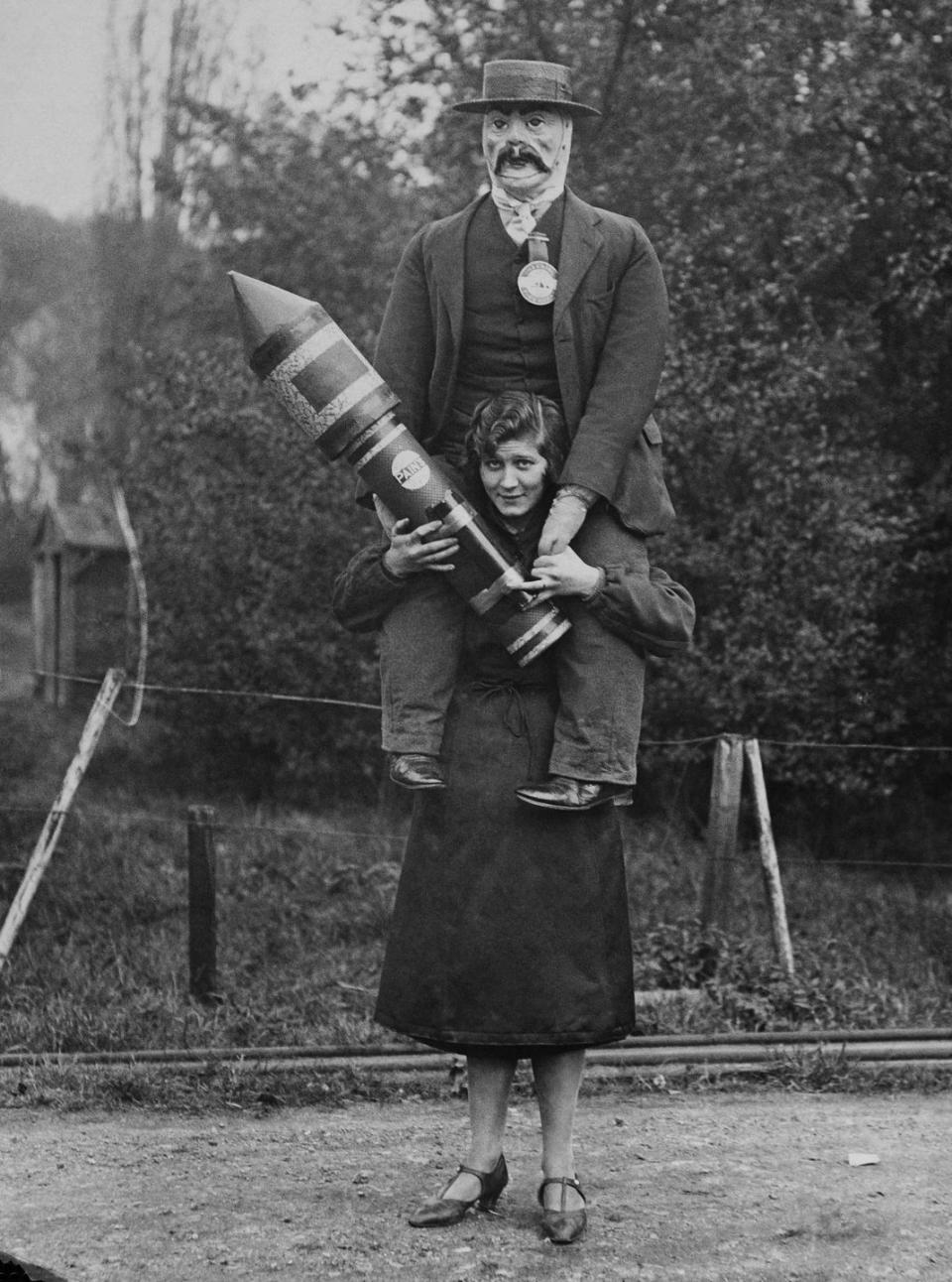 <p>Not entirely sure what this fireworks employee is doing with a dummy on her back, but if I had to see this cursed image, so do you.</p>