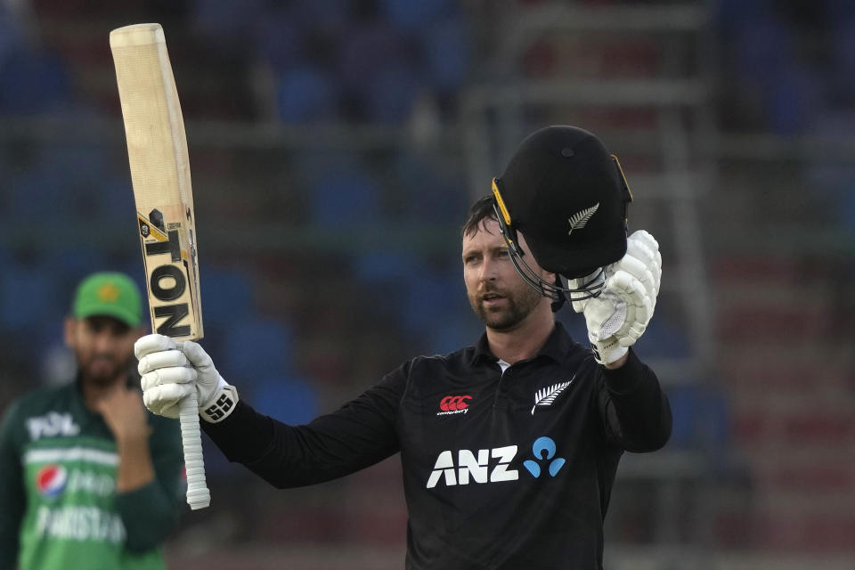 New Zealand's Devon Conway celebrates after scoring century during the second one-day international cricket match between Pakistan and New Zealand, in Karachi, Pakistan, Wednesday, Jan. 11, 2023. (AP Photo/Fareed Khan)