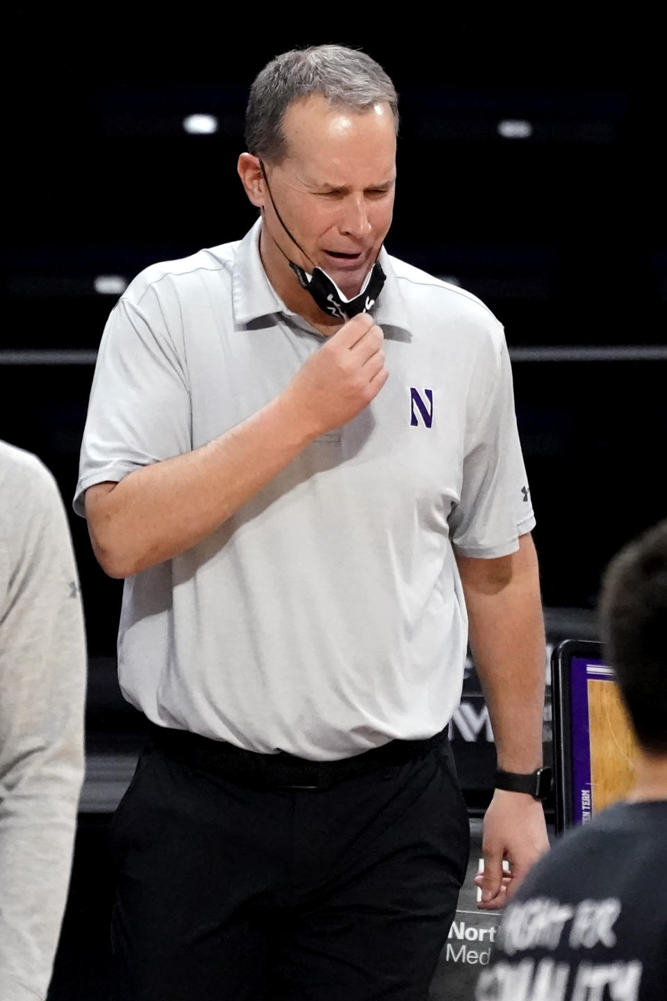 Northwestern head coach Chris Collins reacts as he watches his team during the second half of an NCAA college basketball game against Rutgers in Evanston, Ill., Sunday, Jan. 31, 2021. (AP Photo/Nam Y. Huh)