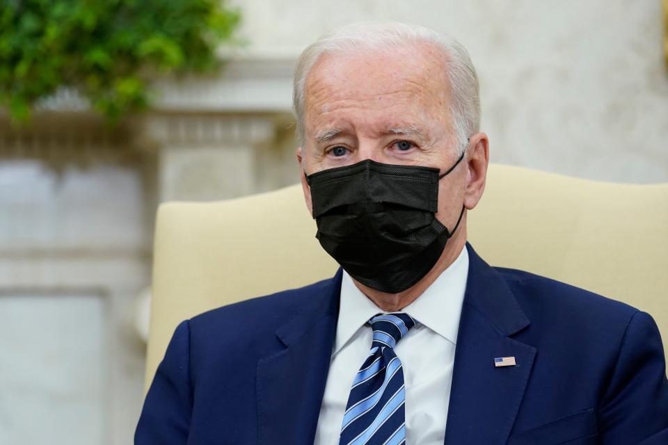 President Joe Biden listens as he meets with Mexican President Andrés Manuel López Obrador in the Oval Office of the White House in Washington, Thursday, Nov. 18, 2021. (AP Photo/Susan Walsh) ORG XMIT: DCSW318