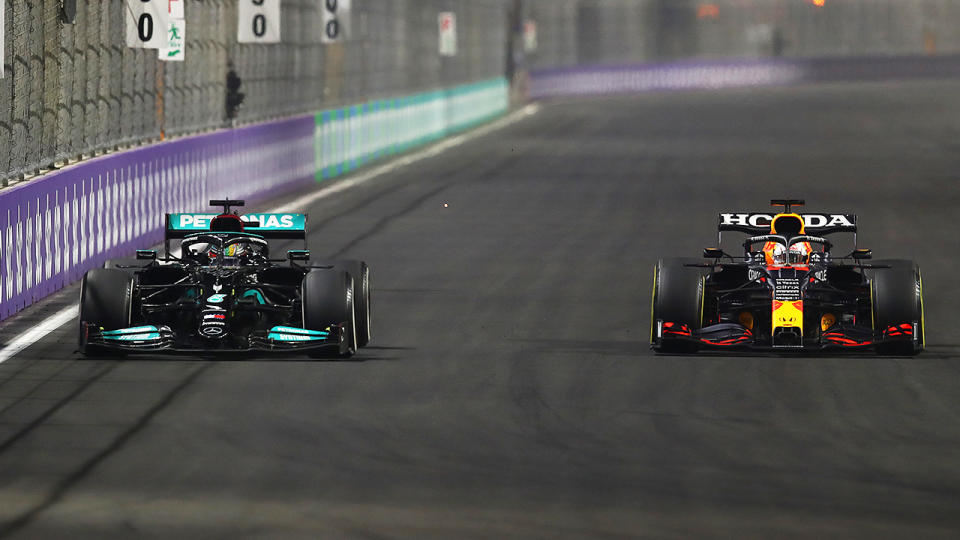 Lewis Hamilton and Max Verstappen, pictured here battling it out in the Saudi Arabia Grand Prix.